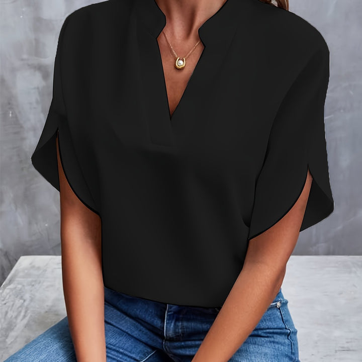 Front view of v-neckline and stand collar, black