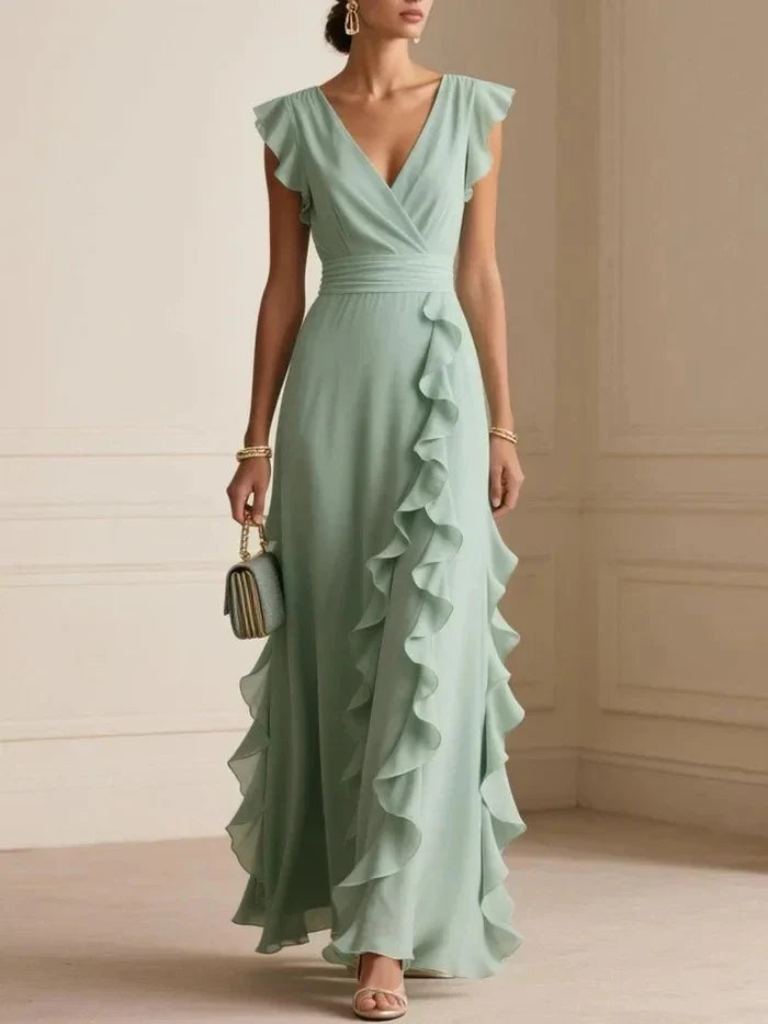 Front view of wrap bodice and cascading side ruffles, mint green