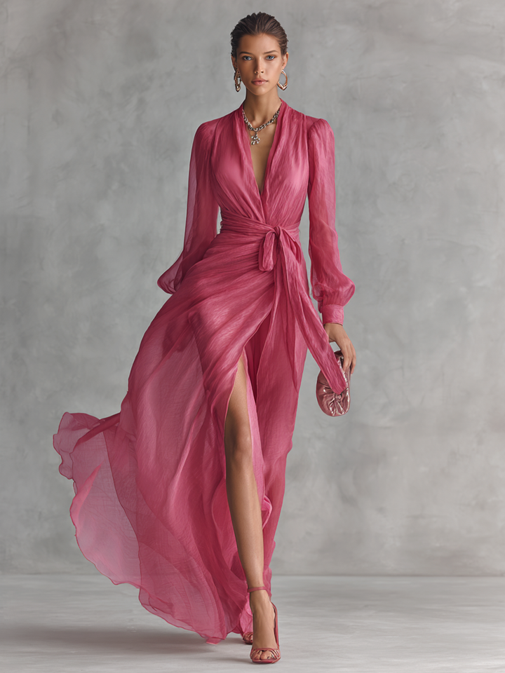 Front view showing v-neckline, wrap bodice, tie waist and floor-length hem