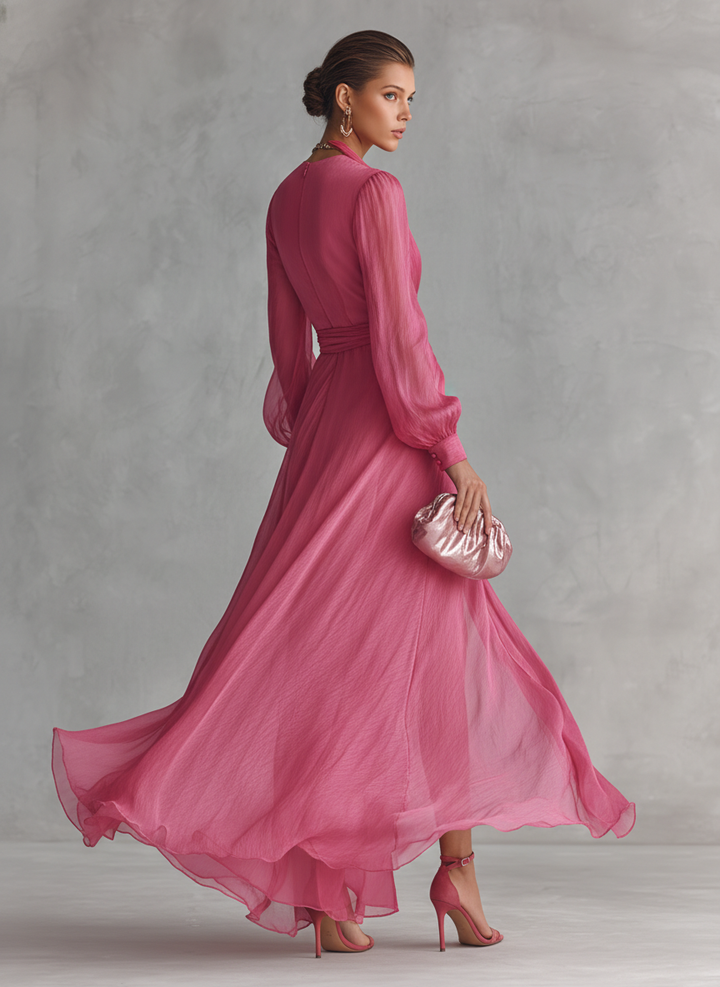 Back view showing back bodice, long sleeves, banded cuffs and skirt