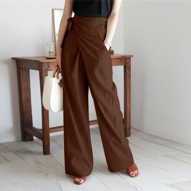 Front view of overlapping front panel and side pocket, dark brown